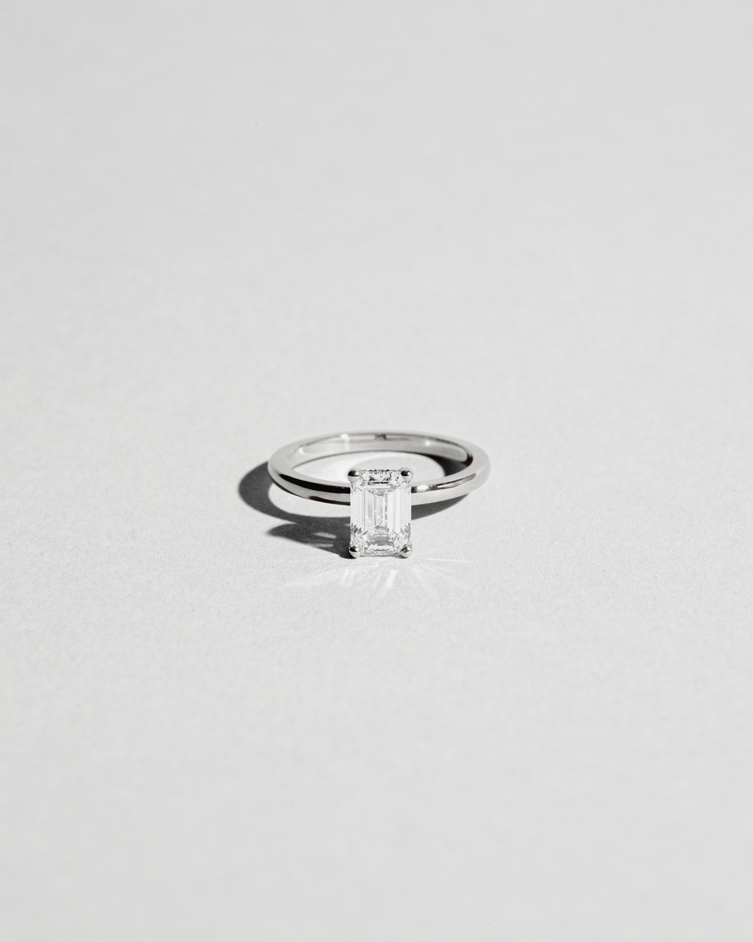 Hidden Halo Solitaire Emerald Diamond Ring